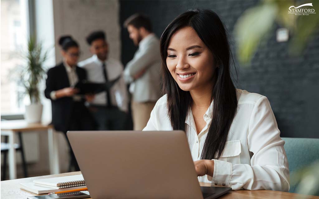  women checking online reviews for catering services