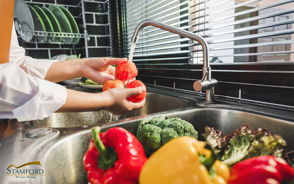 Image of washing some vegetables