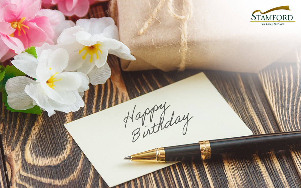 Happy Birthday card and gift for baby celebration.