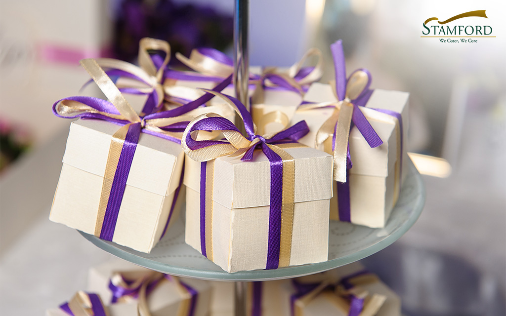 Door gifts for baby's first month celebration.