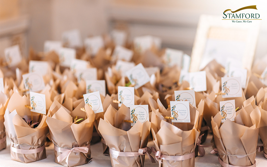 Many baby first month celebration goodie boxes.