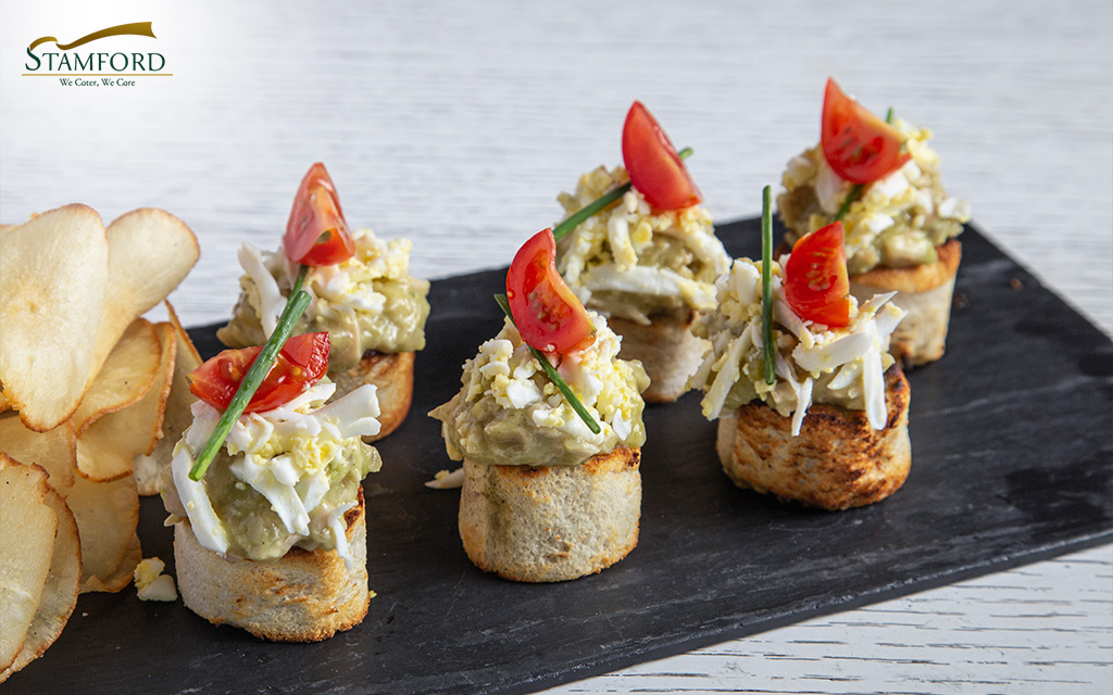 Mini avocado and egg canapés for weddings.