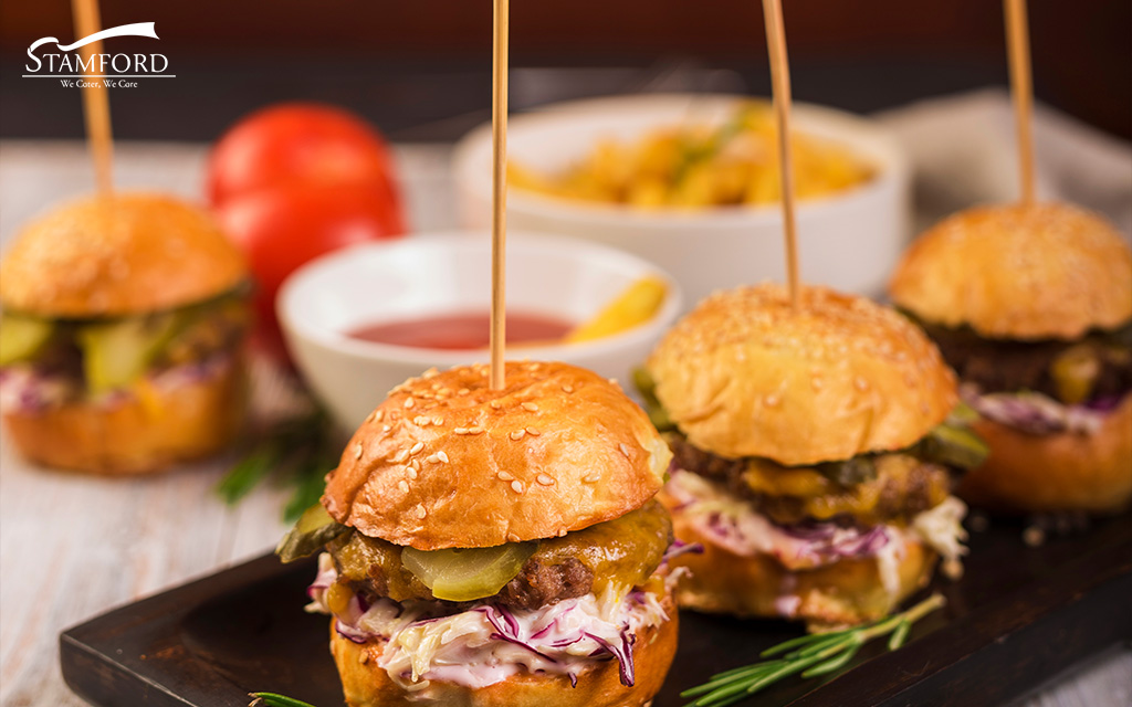 Mini burgers as canapés for a wedding.