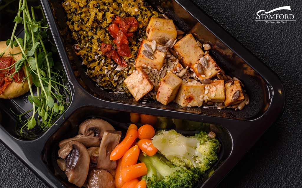 Bento box with healthy quinoa and vegetables.