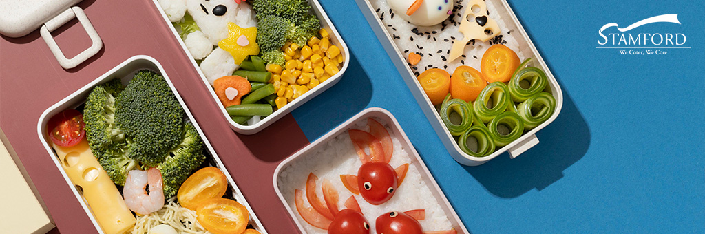 Decorative bento box meals for corporate events.