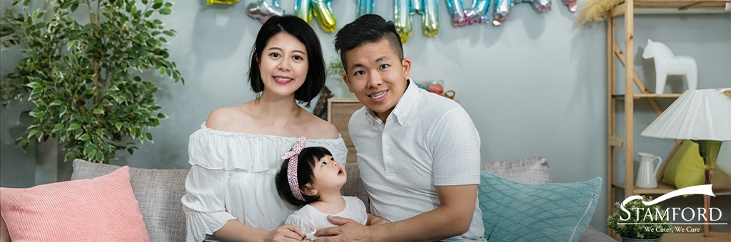 Family celebrating baby's first month at home.